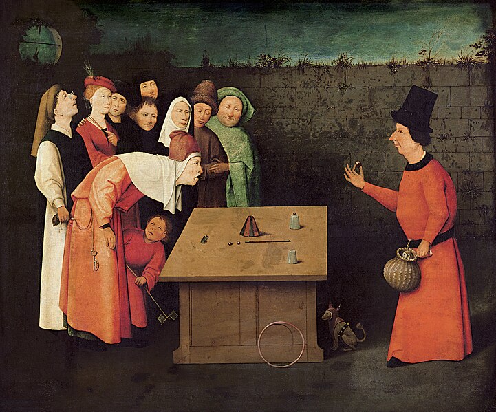 In Bosch's painting The Conjurer, the figure on the left steals an item from an audience member who is intently watching the performance of a magic trick